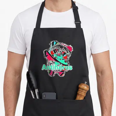 Tablier de cuisine noir avec illustration colorée d'un panda stylisé et du mot Antihéros imprimé en lettres vertes et roses.