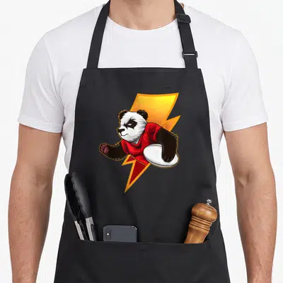 Tablier de cuisine noir avec illustration d'un panda en maillot rouge tenant un disque blanc devant un éclair orange.