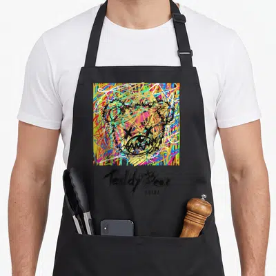 Tablier de cuisine noir avec illustration Teddy Bear Y2K colorée et texte #RTUZ en bas.