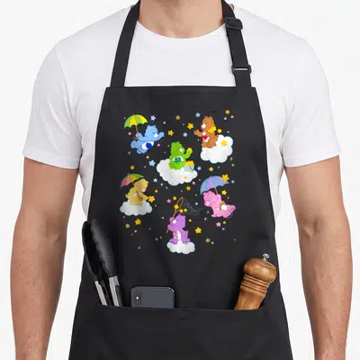Tablier de cuisine noir avec ours colorés sur nuages, parapluies et étoiles dorées