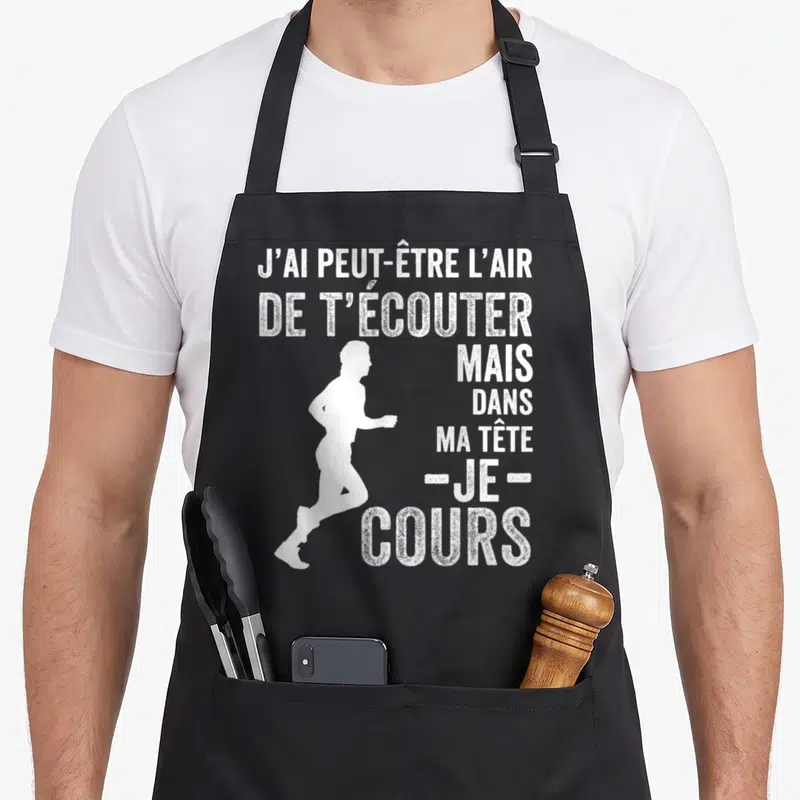Tablier de cuisine noir avec une silhouette de course à pied et le texte j'ai peut-être l'air de t'écouter mais je cours.