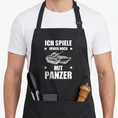 Tablier de cuisine noir avec inscription Je joue toujours avec un véhicule blindé et illustration de char d'assaut blanc.