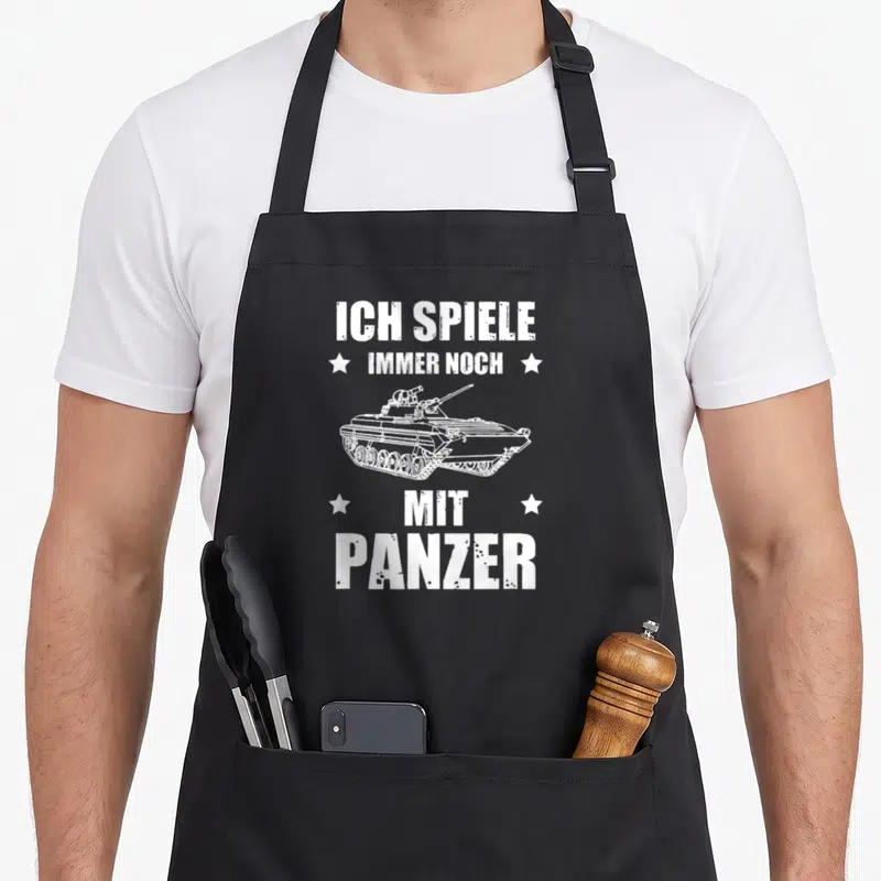 Tablier de cuisine noir avec inscription Je joue toujours avec un véhicule blindé et illustration de char d'assaut blanc.