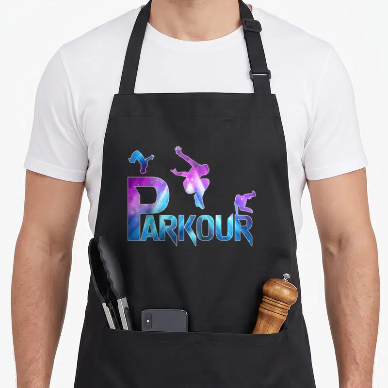Tablier de cuisine noir avec logo Parkour course libre acrobatique stunts aux couleurs galactiques et silhouettes en mouvement.