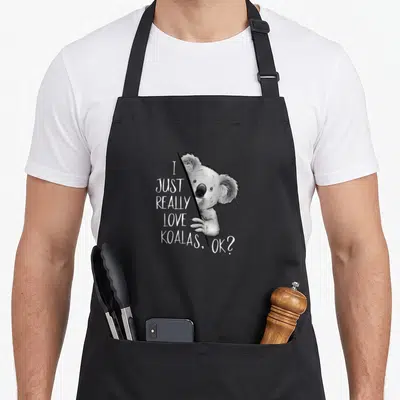 Tablier de cuisine noir avec illustration d'un koala et du texte I just really love koalas, ok ?
