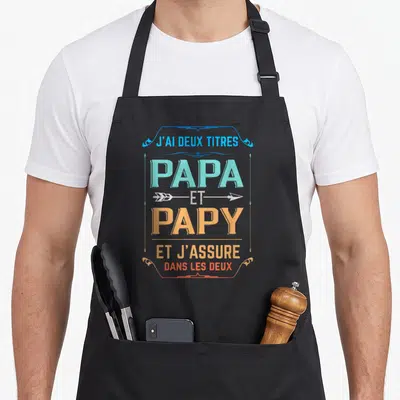 Tablier de cuisine noir avec inscription colorée J'ai deux titres Papa et Papy et j'assure dans les deux