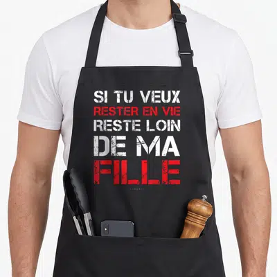 Tablier de cuisine noir avec inscription humoristique blanche et rouge Si Tu Veux Rester En Vie Reste Loin De Ma Fille.
