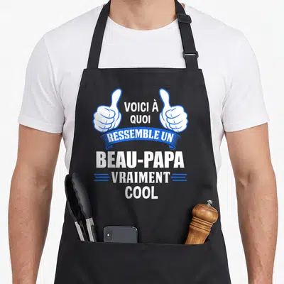 Tablier de cuisine noir avec deux mains faisant des thumbs up et le texte Voici à quoi ressemble un beau-papa vraiment cool.