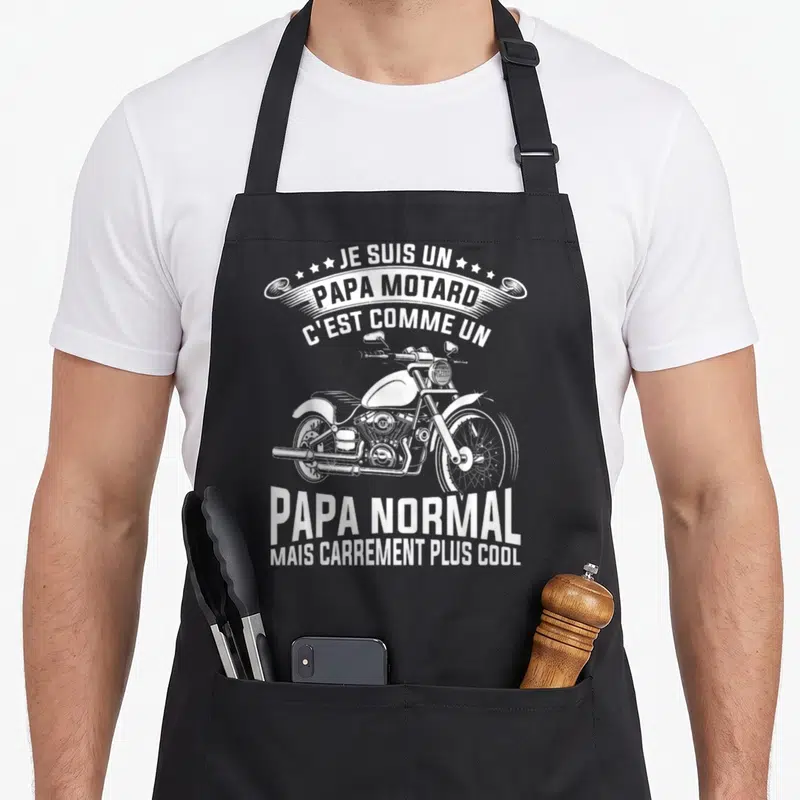 Tablier de cuisine noir avec illustration de moto et texte blanc Je suis un papa motard c'est comme un papa normal mais carrement plus cool