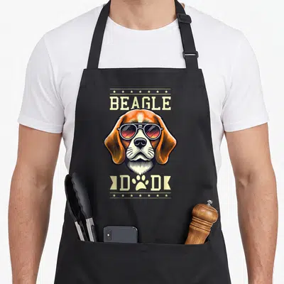 Tablier de cuisine noir avec illustration d'un beagle portant des lunettes de soleil et le texte Beagle Dad en lettres capitales.