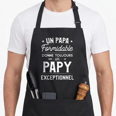 Tablier de cuisine noir avec inscription blanche Un Papa Formidable Donne Toujours Un Papy Exceptionnel et des étoiles.