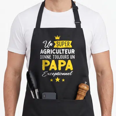 Tablier de cuisine noir avec inscription Un super agriculteur donne toujours un papa exceptionnel et une couronne jaune.