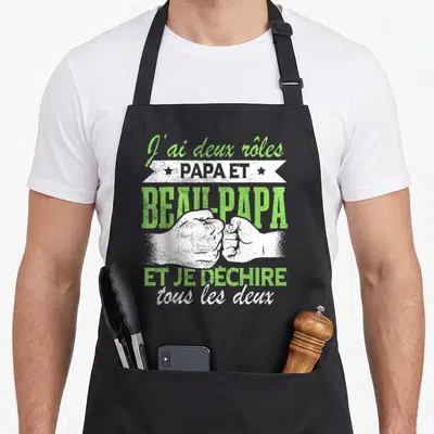 Tablier de cuisine noir avec poings se touchant et texte vert blanc J'ai deux rôles Papa et Beau-papa