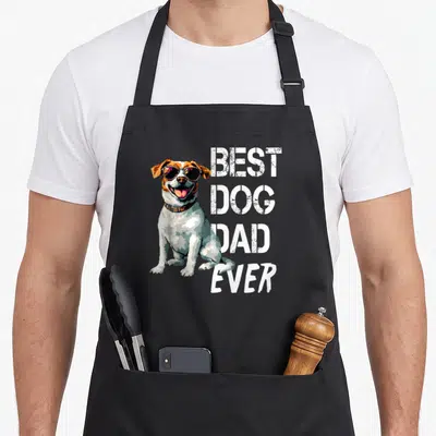 Tablier de cuisine noir avec un chien Jack Russell portant des lunettes noires et du texte blanc vintage.