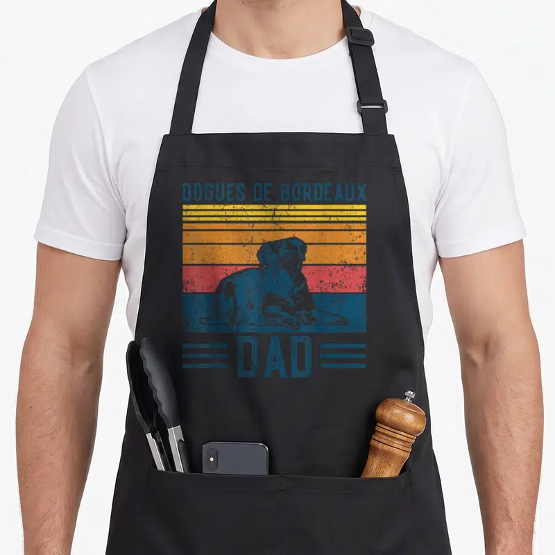 Tablier de cuisine noir avec illustration vintage d'un Dogue de Bordeaux posant sur bandes colorées et le mot Dad en bas.