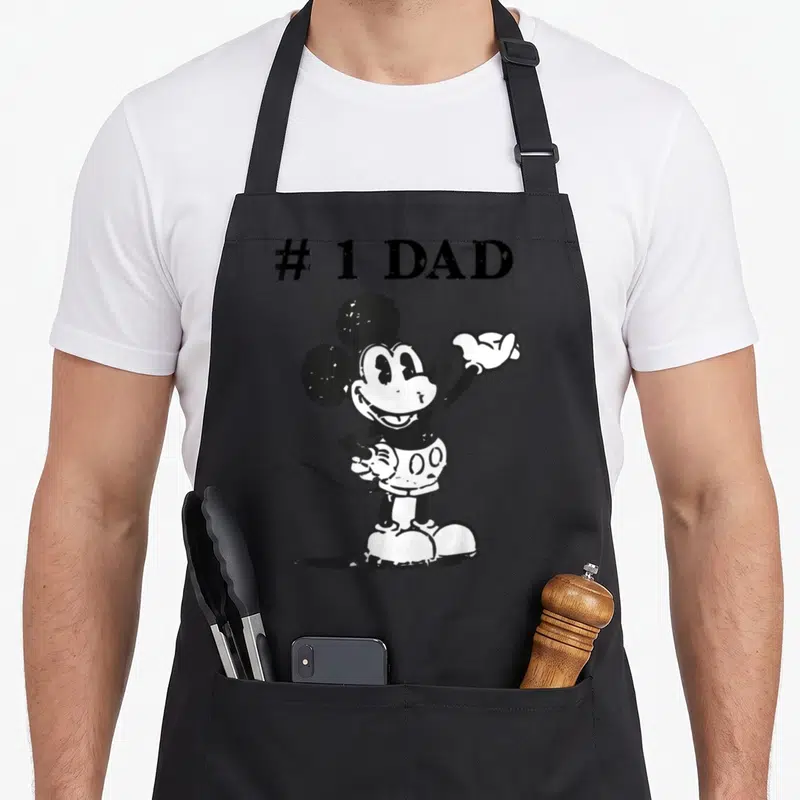 Tablier de cuisine noir avec illustration #1 DAD et Mickey Mouse en noir et blanc style vintage.