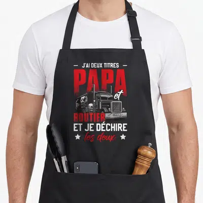Tablier de cuisine noir avec illustration de semi-remorque, skulls et texte rouge blanc J'ai deux titres Papa et Routier.