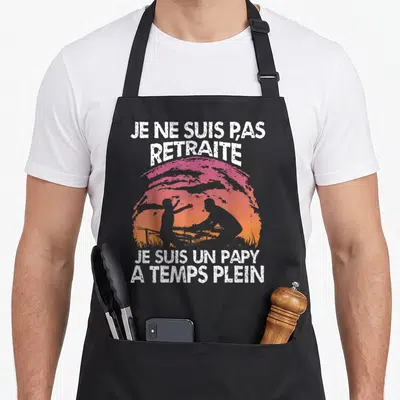 Tablier de cuisine noir avec illustration d'un papy et d'un enfant jouant au ping-pong au coucher du soleil.