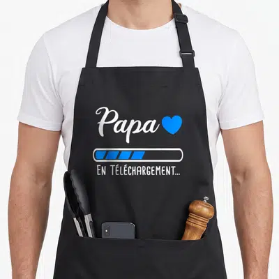 Tablier de cuisine noir avec inscription Papa en téléchargement et icône cœur bleu.
