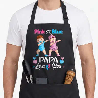Tablier de cuisine noir avec deux bébés dancant et texte Pink Or Blue PAPA Loves You