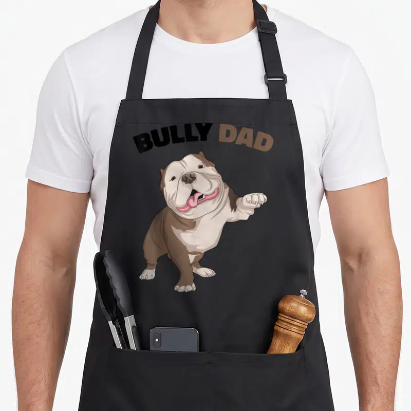 Tablier de cuisine noir avec illustration d'un American Bully marron et blanc et le texte Bully Dad en haut.