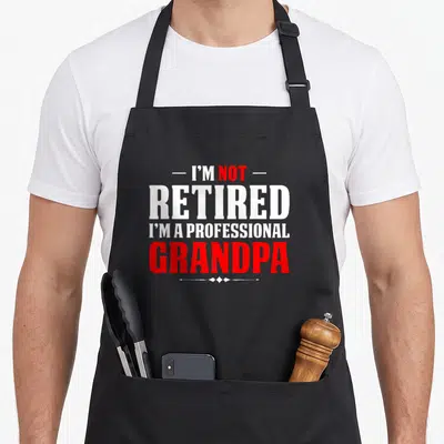 Tablier de cuisine noir avec inscription blanche et rouge Je ne suis pas retraité je suis un professionnel grand-père.