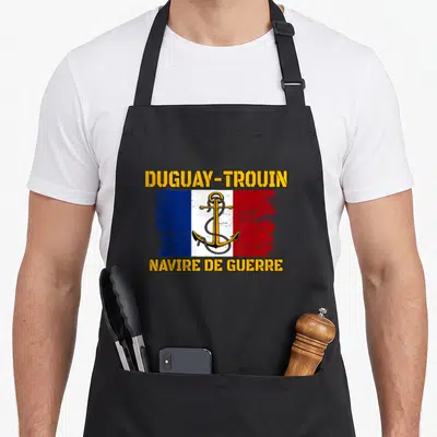 Tablier de cuisine noir avec inscription Duguay-Trouin Navire de Guerre et ancre sur drapeau français.