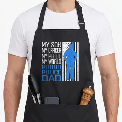 Tablier de cuisine noir avec silhouette bleue de policier et texte blanc My Son My Officer My Pride My World.