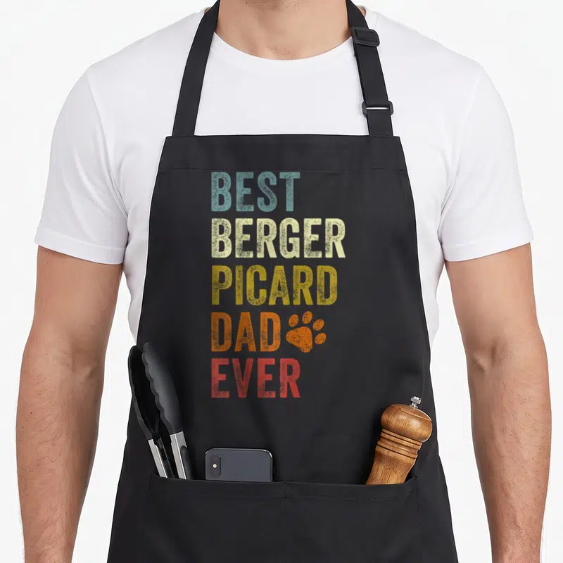 Tablier de cuisine noir avec inscription Best Berger Picard Dad Ever et patte orange style vintage.