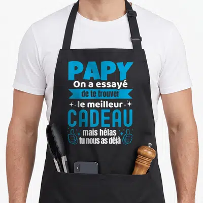 Tablier de cuisine noir avec inscription bleue et blanche Papy On a essayé de te trouver le meilleur cadeau mais hélas tu nous as déjà.