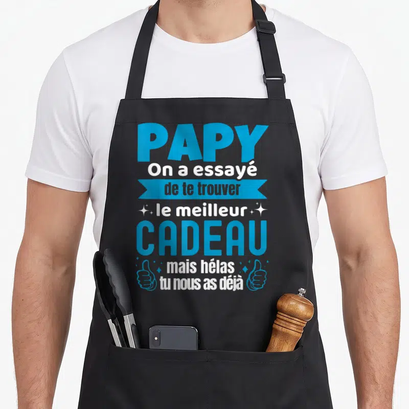Tablier de cuisine noir avec inscription bleue et blanche Papy On a essayé de te trouver le meilleur cadeau mais hélas tu nous as déjà.