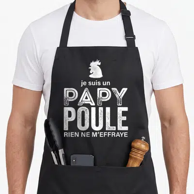 Tablier de cuisine noir avec silhouette de coq et texte blanc je suis un papy poule rien ne m'effraye
