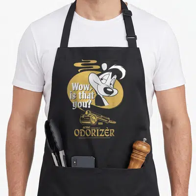 Tablier de cuisine noir avec illustration de Pepe Le Pew et texte Wow is that you sur fond jaune.