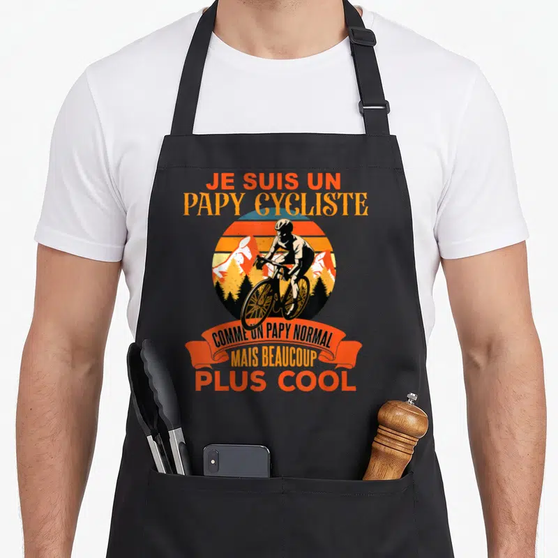 Tablier de cuisine noir avec illustration vintage d'un cycliste et texte orange Je suis un papy cycliste comme un papy normal mais beaucoup plus cool.
