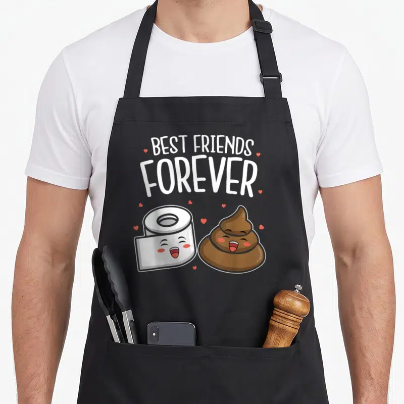 Tablier de cuisine noir avec illustration papier toilette et fèces souriants Best Friends Forever entourés de petits cœurs roses.