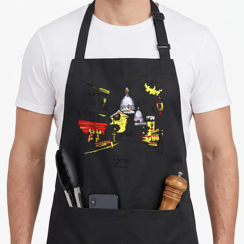 Tablier de cuisine noir avec illustration colorée de Montmartre, Sacré-Cœur et Paris France
