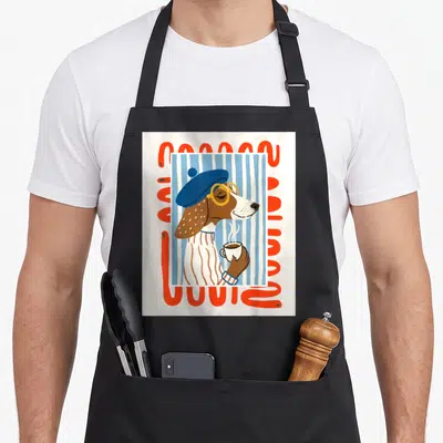 Tablier de cuisine noir avec illustration d'un chien parisien au béret tenant un café chaud sur fond rayé bleu et cadre orange.