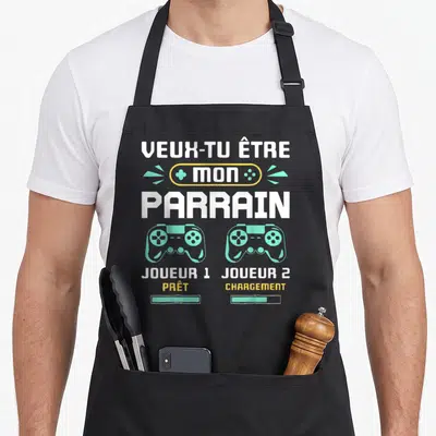 Tablier de cuisine noir avec texte Veux-tu être Mon Parrain et deux manettes de jeu vidéo vertes