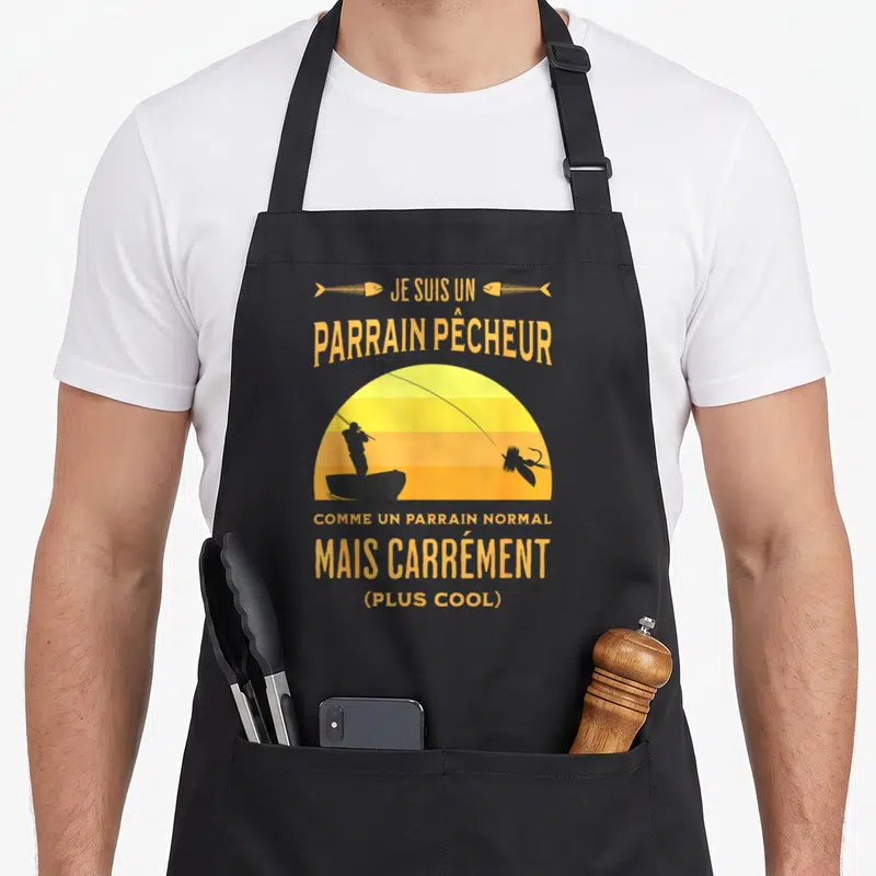 Tablier de cuisine noir avec silhouette de pêcheur et texte Je suis un parrain pêcheur mais carrément plus cool