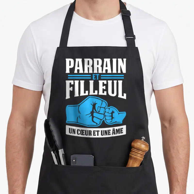 Tablier de cuisine noir avec inscription Parrain et Filleul et deux poings bleus qui se touchent.