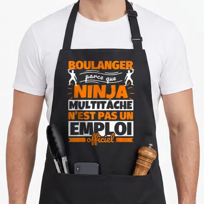 Tablier de cuisine noir avec inscription orange et blanche boulanger ninja multitâche emploi « officiel »