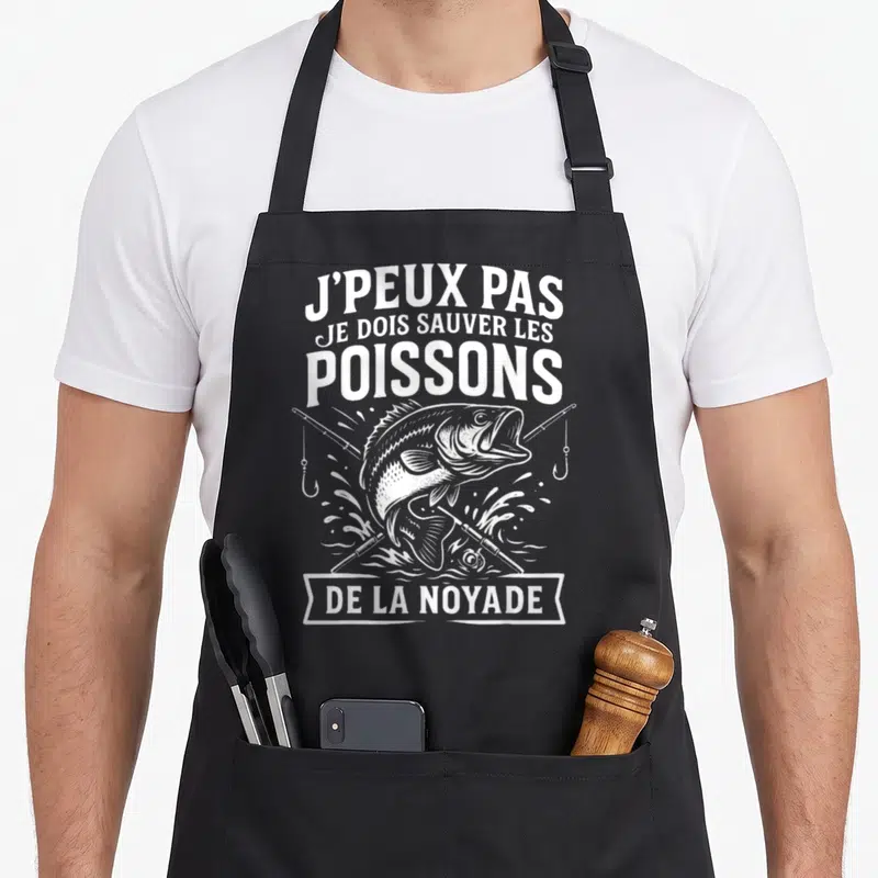Tablier de cuisine noir avec inscription blanche J'peux pas je dois sauver les poissons de la noyade et illustration de poisson sautant.