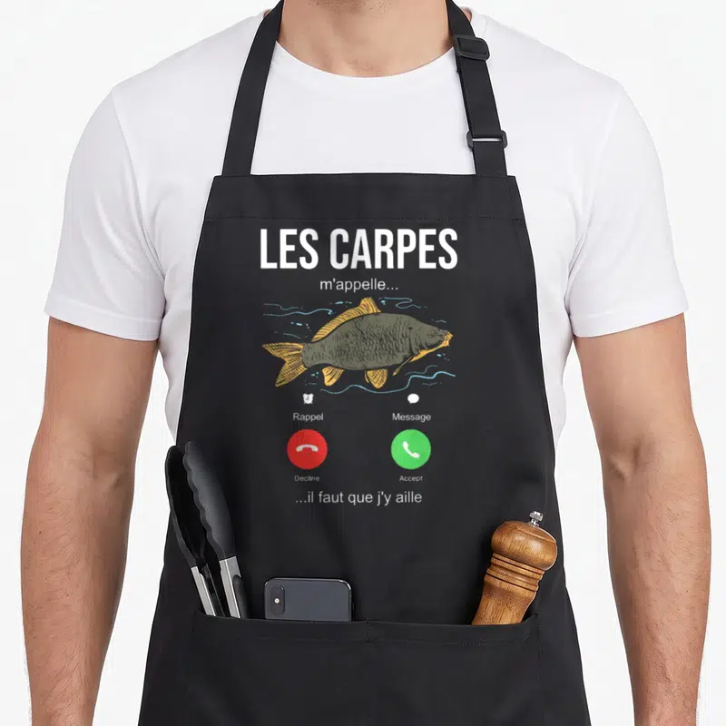 Tablier de cuisine noir avec illustration d'une carpe et boutons d'appel téléphonique rouges et verts.