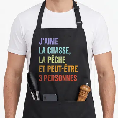 Tablier de cuisine noir avec inscription colorée J'aime la chasse la pêche et peut-être 3 personnes.