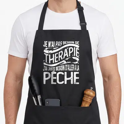Tablier de cuisine noir avec inscription blanche Je n'ai pas besoin de thérapie et silhouettes de poissons.