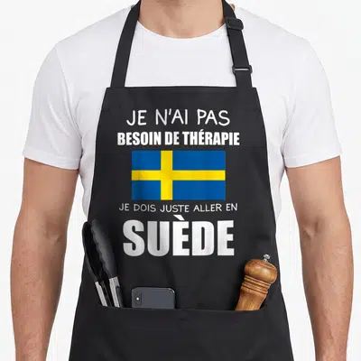 Tablier de cuisine noir avec le drapeau suédois et le texte Je dois juste aller en Suède imprimé en blanc.