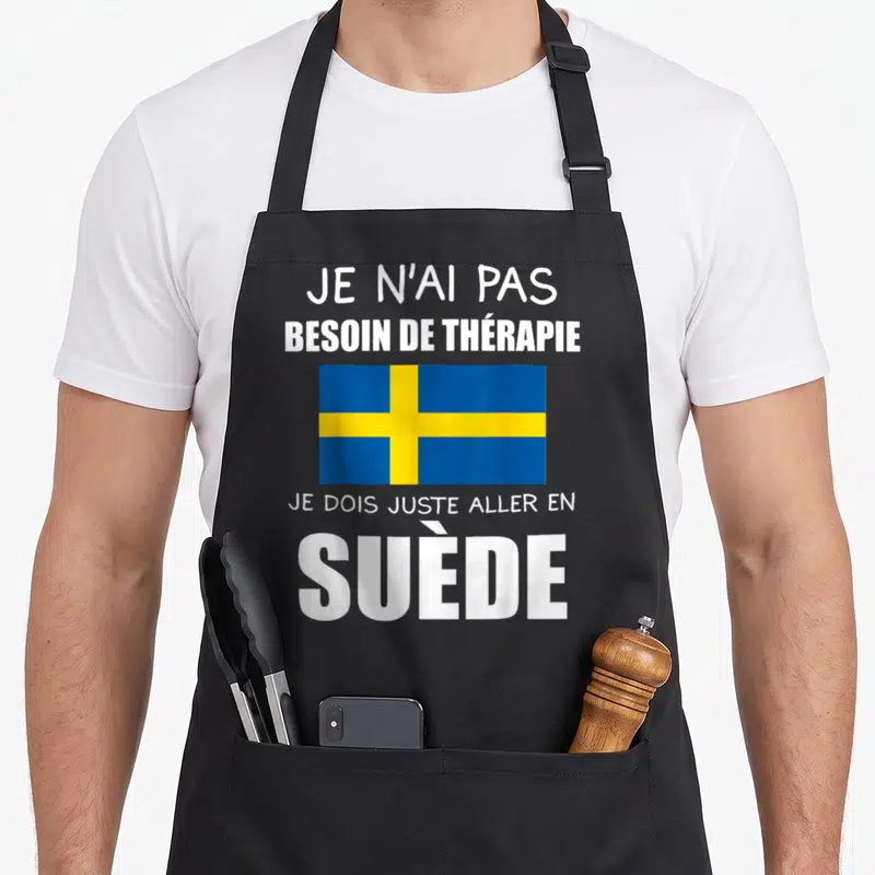 Tablier de cuisine noir avec le drapeau suédois et le texte Je dois juste aller en Suède imprimé en blanc.