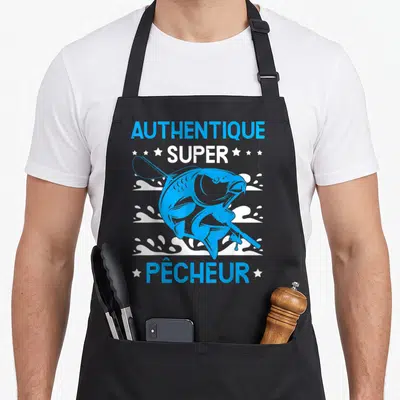 Tablier de cuisine noir avec illustration d'un poisson sautant tenant une canne à pêche en bleu et blanc.