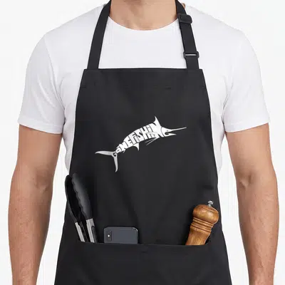 Tablier de cuisine noir avec un marlin blanc stylisé et l'inscription GONE FISHING dans son corps.