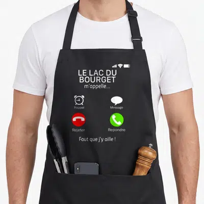 Tablier de cuisine noir avec un écran d'appel téléphonique blanc et des boutons rouges et verts.